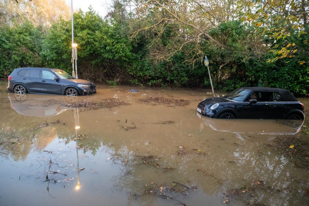 Two cars stranded in flood water